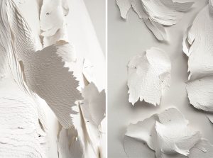 Angèle Guerre, plasticienne, 2018, « Les Mues ». Papiers incisés au scalpel et clous. Les mues sont des formes mutantes tirées du travail « Tendre texte ». Ce sont des peaux de papier presqu’animales. Épinglées là, elles dansent.