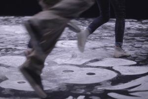 October 2017 -Drawn directly on the dance carpets using white chalk, the artist Emilie Faïf brought out the idea of territory, roots and cultures that inspired popular dances. Ornemental patterns being brushed away shows the tension between danse and its durability in popular traditions. Photography © Edmond Carrere.