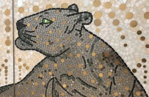 Mathilde Jonquière, mosaic artist, may 2019, Cartier Serrano store, Madrid. The golden dressed panther, totemic attribute of Jeanne Toussaint, is a part of the pictorial history of the House. Sovereign, the panther stares directly at the majestic peacock eyes.
