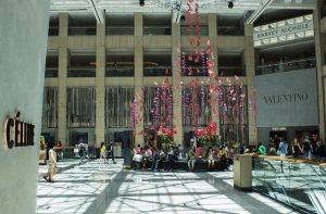 William Amor, upcycling artist, June-July 2018, suspended art installation. William Amor creates a suspended art installation in situ for Landmark Hong Kong’s mall. This artwork is composed of petals and flowers made of recycled plastic bags. 
