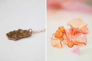 William Amor, upcycling artist, Floral creation from the waste of the Maison Rare Champagne for Rare Rose Millésime 2012, Paris, November 2022. Between embossing and crimping, William Amor transforms gravel and tartar from champagne vats into crystallized pendants.