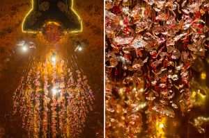 William Amor, upcycling artist, “Theater of Metamorphosis” art installation for the Lancôme exhibition, Shanghai, dimensions 700cm x 500cm x 500cm, December 2023. Looking up, the Cascade of Roses, formed by eternal roses made from recycled Lancôme plastic waste, forms the centerpiece of the installation.